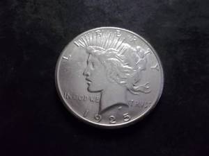 lot 33 image: 1925 S Peace Silver Dollar