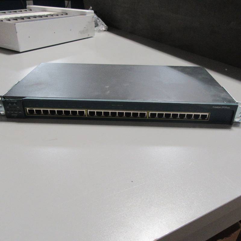 lot 86 image: Cisco 24 Port 2950 series Switch