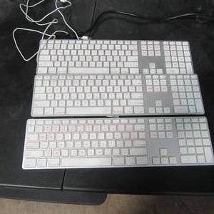 lot 11 image: Lot of 3 Apple Keyboards wfull number pads