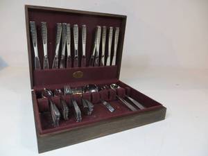 lot 74 image: 66 Piece Stainless Silverware Set by International