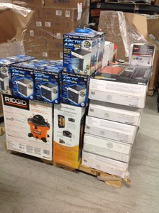 lot 22 image: Pallet with assorted Heaters and fans and other big box customer returns condition ranges from in ike new to good condition