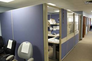 lot 125 image: Two-Room Office Cubicle with J-Shaped Desk, Rolling Office Arm Chair, Metal File Cabinets, Over-Desk Cabinets