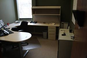 lot 127 image: J-Shape Office Desk, Rolling Office Arm Chair, Cubicle Wall Section, Whiteboard, Metal File Cabinet, Metal Lateral File Cabinet, Over-Desk Cabinet, Floor Protector