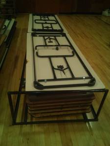lot 10 image: 12 Folding Table W rolling Cart Storage.