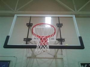 lot 19 image: Reg. Basketball Backboard, Rim and Net. Bring tools for removal.