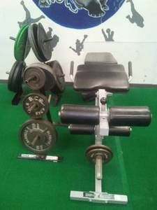 lot 46 image: Weightlifting weights and bench