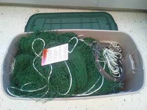 lot 110 image: Volleyball Net  Like New Regulation Size. in oversized tote.