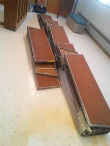 lot 115 image: 6 sections of Performance Risers, 2 risers were late for the group photo  Angled. 7 ft. x 18 in. deep