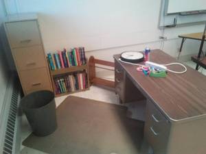 lot 123 image: Misc. Office Desk, File 2 Bookshelves, garbage can, floor mats, clock and more
