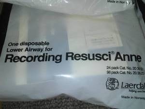 lot 473 image: Recording Resusci Anne packs CPR replacement mouth pieces.