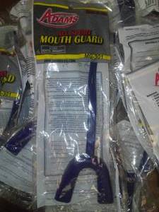 lot 481 image: Set Schutt football chinstraps  helmet face mask hardware, Adams mouth guards