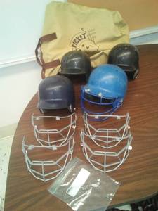 lot 748 image: 4 helmets 4 masks baseball Softball masks are new - some hardware. Loc class rm 101