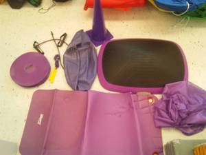 lot 751 image: Purple Exerfit Rainbow exercise set. Includes mat ball, Balance Disc and more. Loc class rm 101