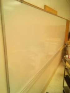 lot 766 image: 12 ft. white board 4 ft. cork board, Claridge. Loc class rm 101