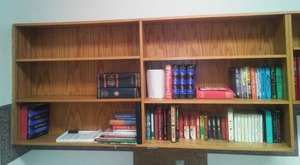 lot 581 image: Wall Mount Wood Shelves w contents. 79in. L x 3 ft. H x 11 in. D. Loc. Lbry Office.