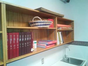 lot 582 image: Wall Mount Wood Shelves with contents. 79in. L x 2 ft. H x 11 in. D. Loc. Lbry Office.