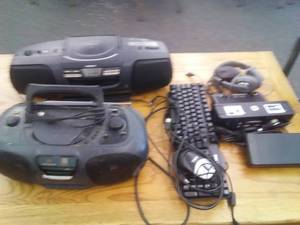 lot 587 image: HP Laptop Docking Station, Sony, Magnavox Portable Radios   and more. Loc Lbry Office.