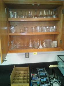 lot 512 image: Science Cupboard Lot. Beakers and more  see pics. Loc Rm 99 Sci