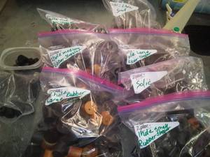 lot 545 image: Rubber Stopper  Variety Sizes and holes. Loc. Sci Rm 99
