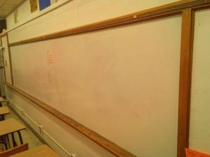 lot 634 image: 16 ft. Whiteboard and corkboard. Sci Rm 99