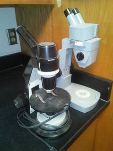 lot 671 image: Microscopes (2) American Optical and Bausch and Lomb. Sci Office Rm 99