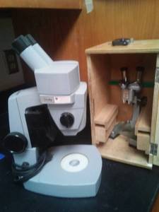 lot 672 image: Microscopes (2) American Optical and Tasco. Sci Office Rm 99