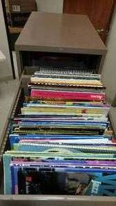 lot 397 image: Metal File Cabinet with contents Music related
