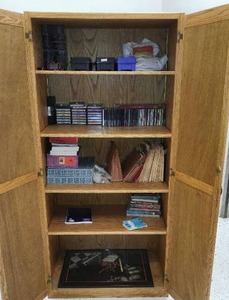 lot 401 image: Wood Cabinet with contents music related