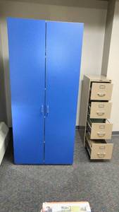 lot 181 image: Blue Cabinet, cork board, file cabinet with contents.