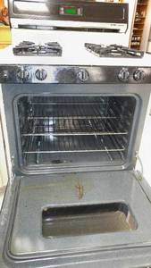 lot 440 image: GE Hotpoint Gas Range, Working Condition,  See pictures for burner ratings.
