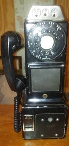 lot 697 image: Vintage Coin Operated Telephone  not tested. Loc 3-Prop Rm