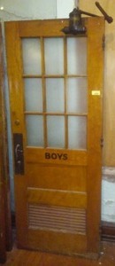 lot 721 image: Vintage Boys Bathroom Door, Complete with Power Closure. 80 x 31.75in. Loc 3-Prop Rm