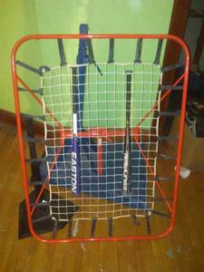 lot 729 image: Baseball Pitch Back, bats, T-Ball stand, Toss Back Pitchback Stand. Loc 3-D Rm