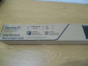 lot 9 image: Perma IndoorOutdoor Retractable Baby Gate 33 Tall, Extends to 71 Wide, Gray