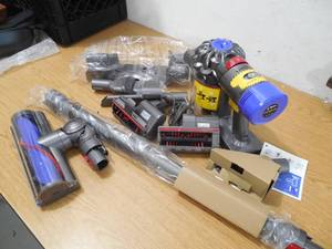 lot 78 image: NEW - Dyson V7 Animal Pro Cordless Stick Vacuum Cleaner with Extra Tools