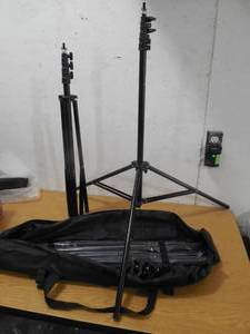 lot 87 image: (2) TRI PODS