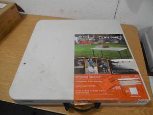 lot 96 image: Lifetime 48 in. Almond Plastic Adjustable Height Folding High Top Table