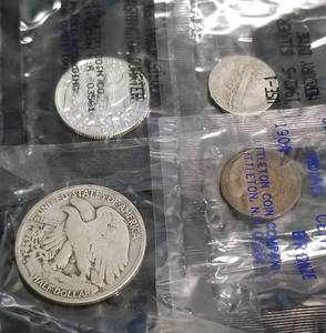lot 23 image: 4 COINS IN SEALED LITTLETON PACKAGING AS PICTURED
