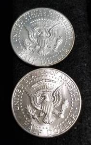 lot 33 image: 2 AU-UNC 1964 KENNEDY SILVER HALF DOLLARS