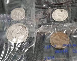 lot 45 image: 4 COINS IN SEALED LITTLETON PACKAGING AS PICTURED