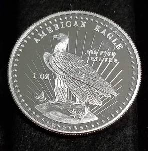 lot 54 image: PRE SILVER EAGLE 1982 1 TROY OZ .999 FINE SILVER AMERICAN EAGLE