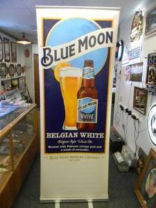 lot 20 image: BLUE MOON BEER - Retractable display banner stand  easy to set up and take down OR CAN BE HUNG - LARGE VERY COOL APPROX 30 X 80 - SEE PICTURES