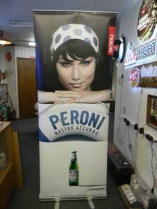 lot 44 image: PERONI BEER - Retractable display banner stand  easy to set up and take down OR CAN BE HUNG - LARGE VERY COOL APPROX 30 X 80 - SEE PICTURES