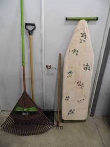lot 63 image: Ironing Board - Rake - Shovel