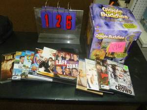 lot 126 image: 11 Dvds. & costume. As shown. SEE TERMS