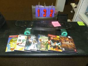 lot 132 image: Kryptonics skate board & Play Station 2 games. As shown. SEE TERMS
