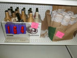 lot 164 image: Decorative Bottles & Fabrics. As shown. SEE TERMS