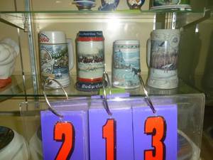 lot 213 image: Qty of 4 Beer mugs. As shown. SEE TERMS