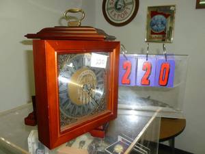 lot 220 image: Howard Miller Jewelry Box Clock. As shown. SEE TERMS