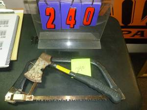 lot 240 image: Hatchet & Swede Saw. As shown. SEE TERMS